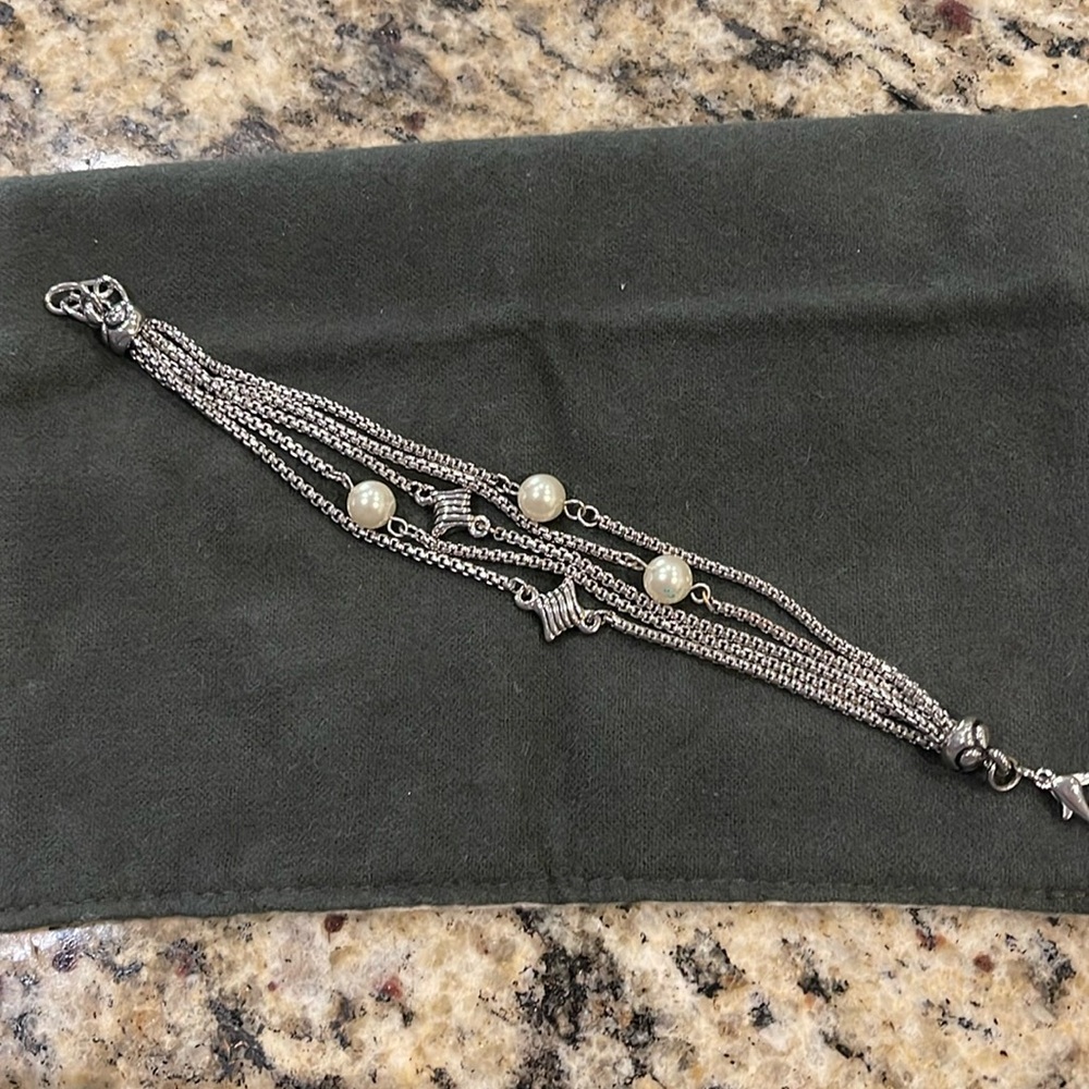 Costume 5 strand pearl and silver bracelet, 8” long.